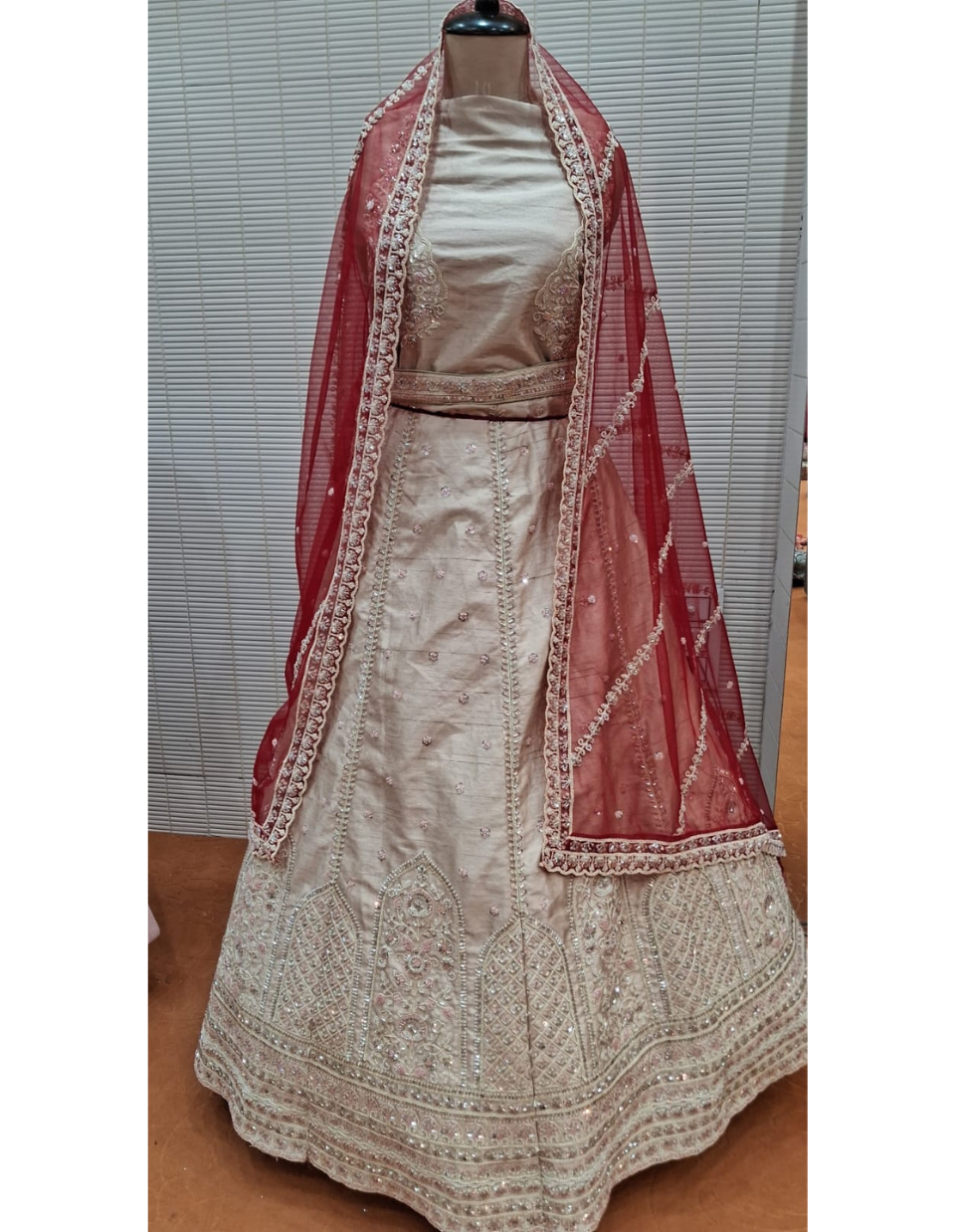 Elegant Off-White and Maroon Embroidered Party Wear Lehenga