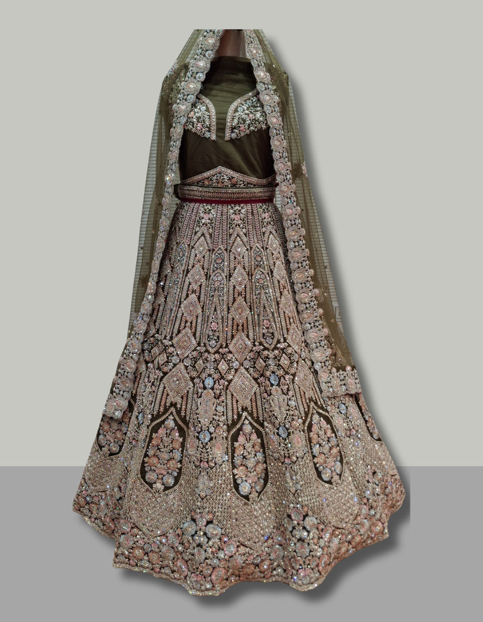 Olive Green Velvet Bridal Lehenga with Heavy Embellishments