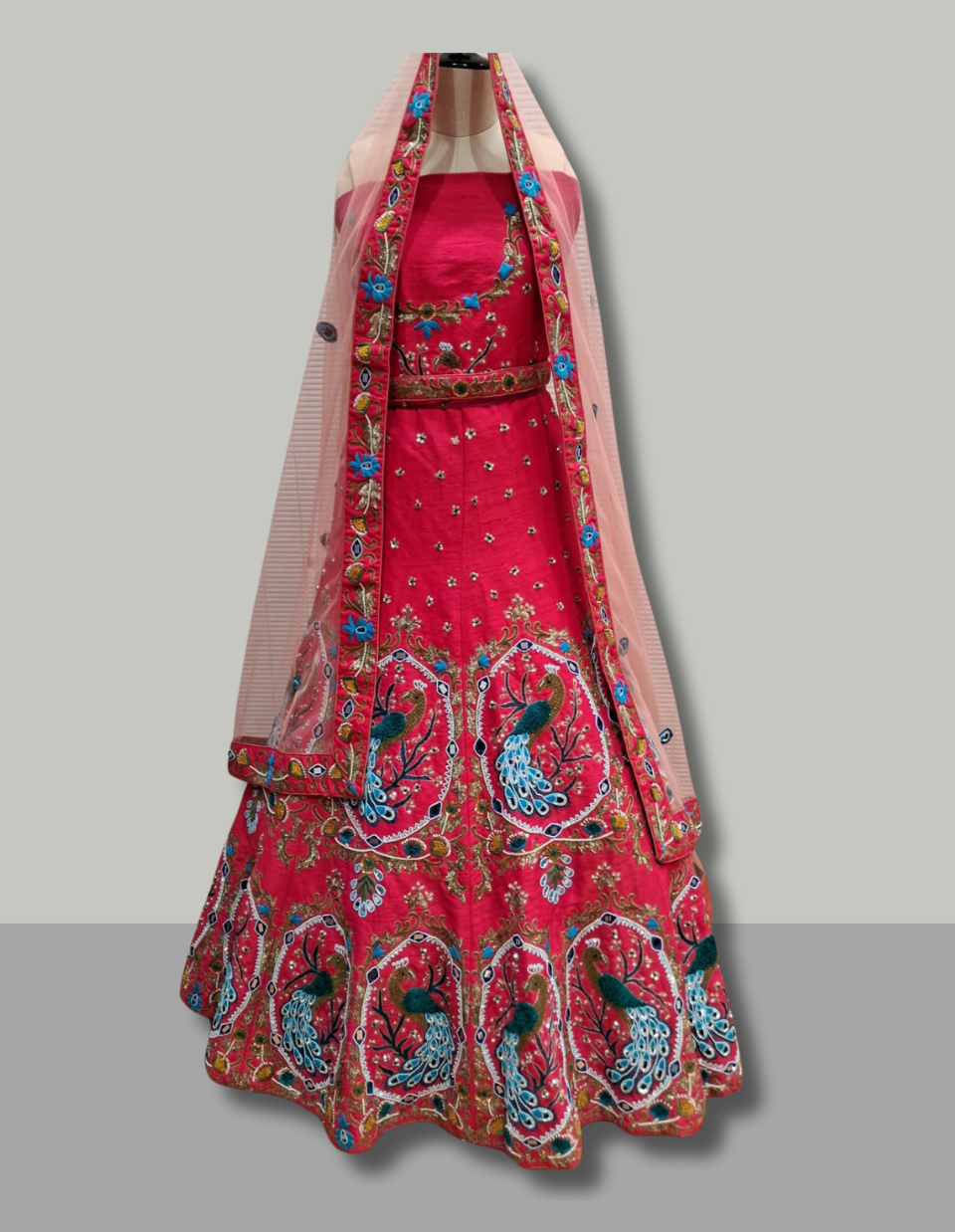 Vibrant Rani Pink Multicolor Peacock Embroidered Lehenga