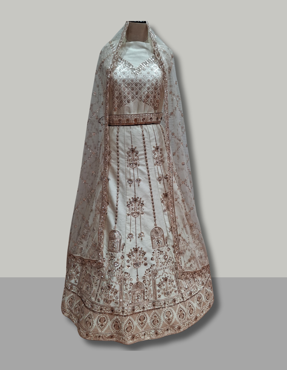 Ivory Net Bridal Lehenga with Antique Gold Embroidery