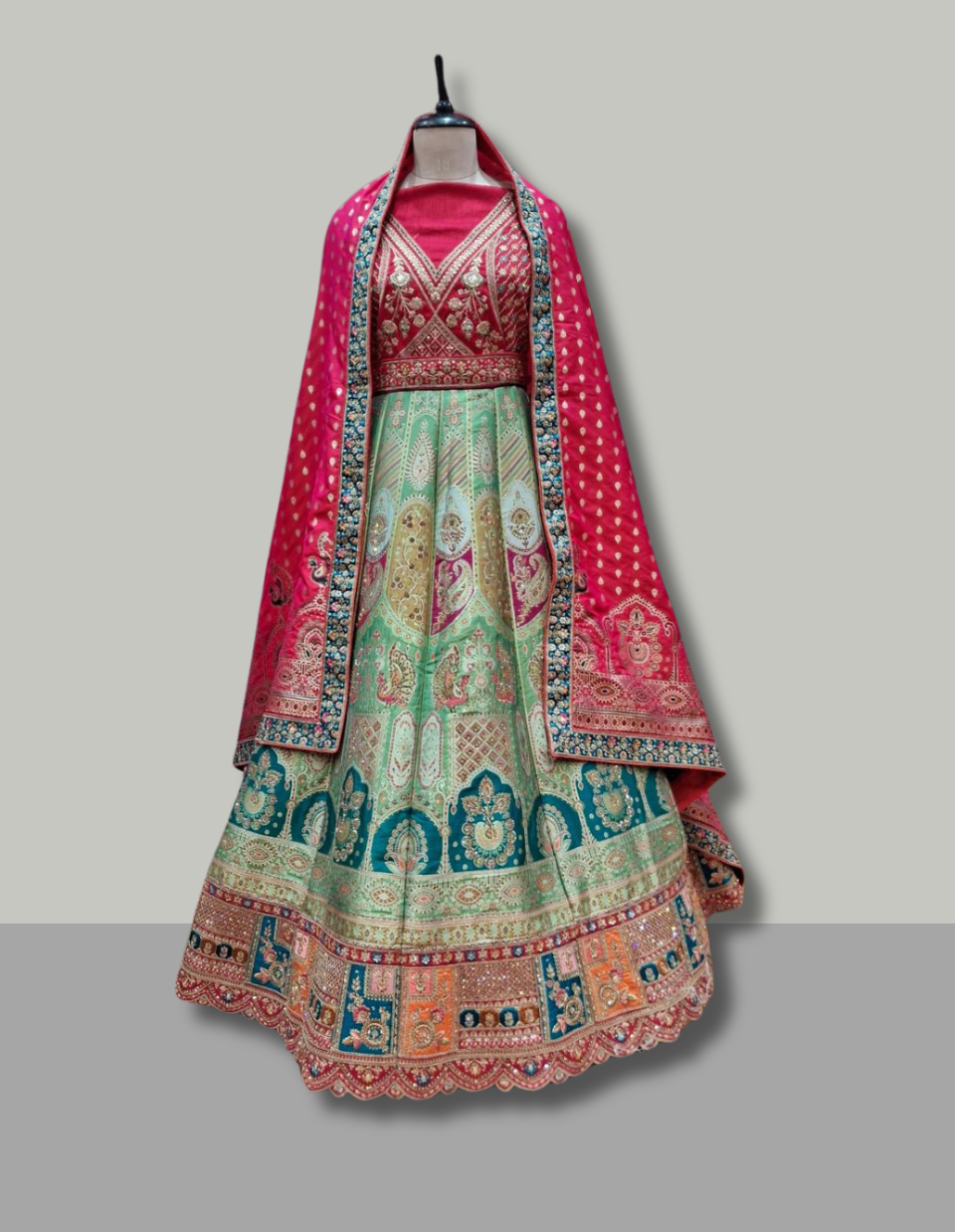 Aqua Green Multicolor Patola Printed Silk Lehenga with Pink Dupatta