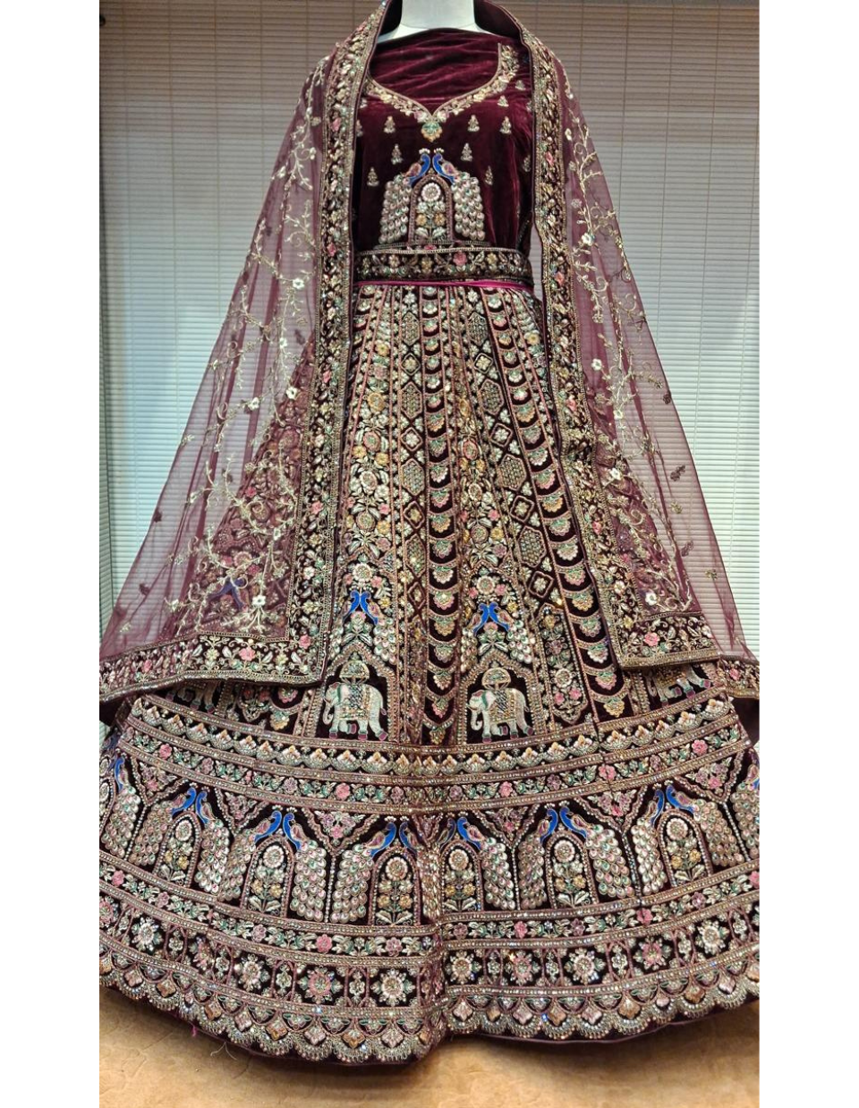 Regal Maroon Velvet Lehenga with Elephant Motif & Heavy Zari Embroidery