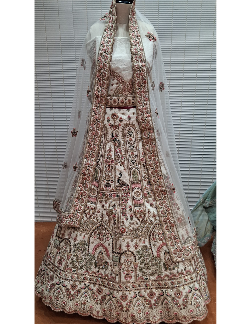 Elegant Peach Embroidered Net Lehenga Choli with Dupatta
