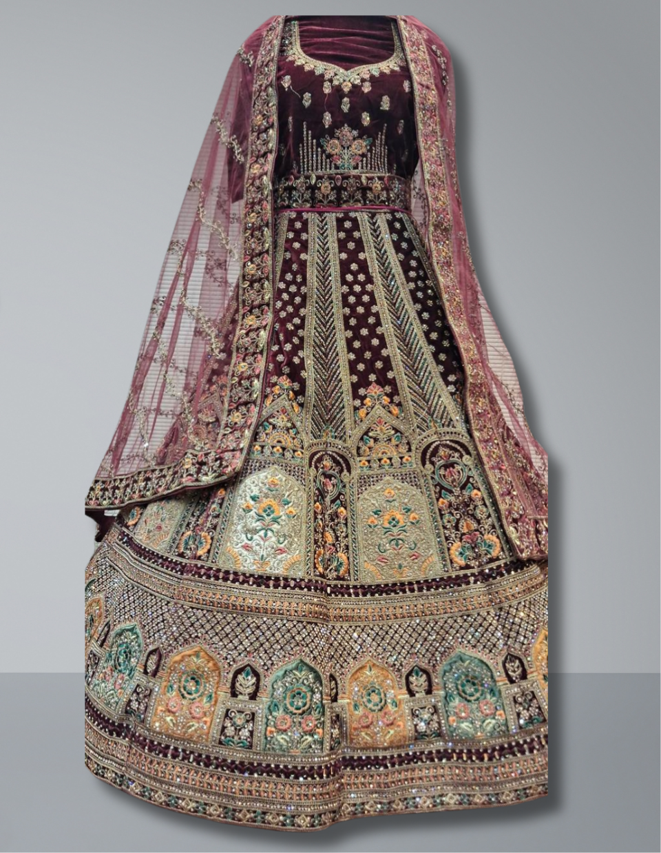 Deep Maroon Bridal Lehenga with Architectural Motifs and Floral Embroidery
