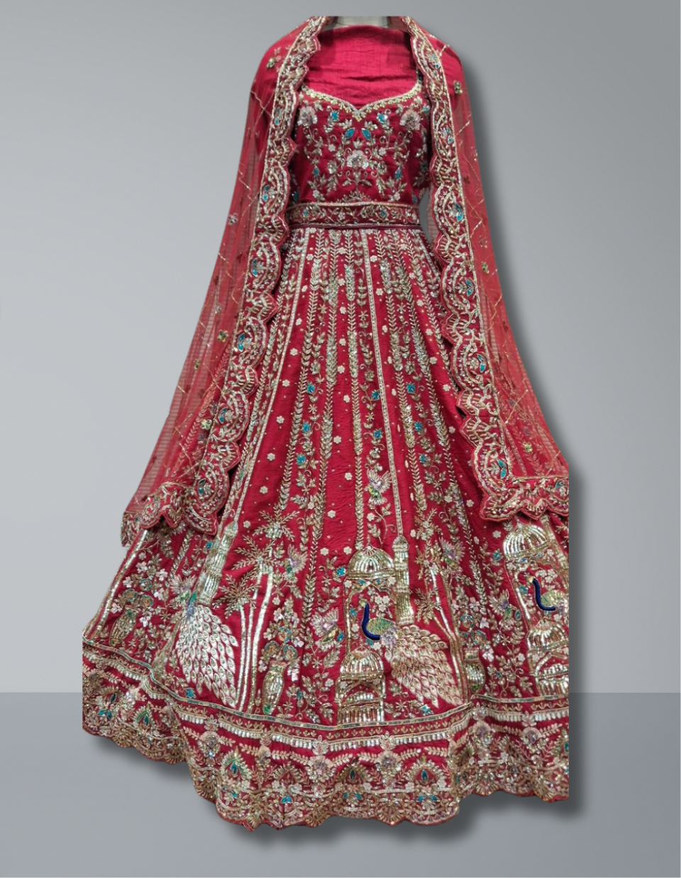 Exquisite Red Bridal Lehenga with Peacock and Palace Motifs