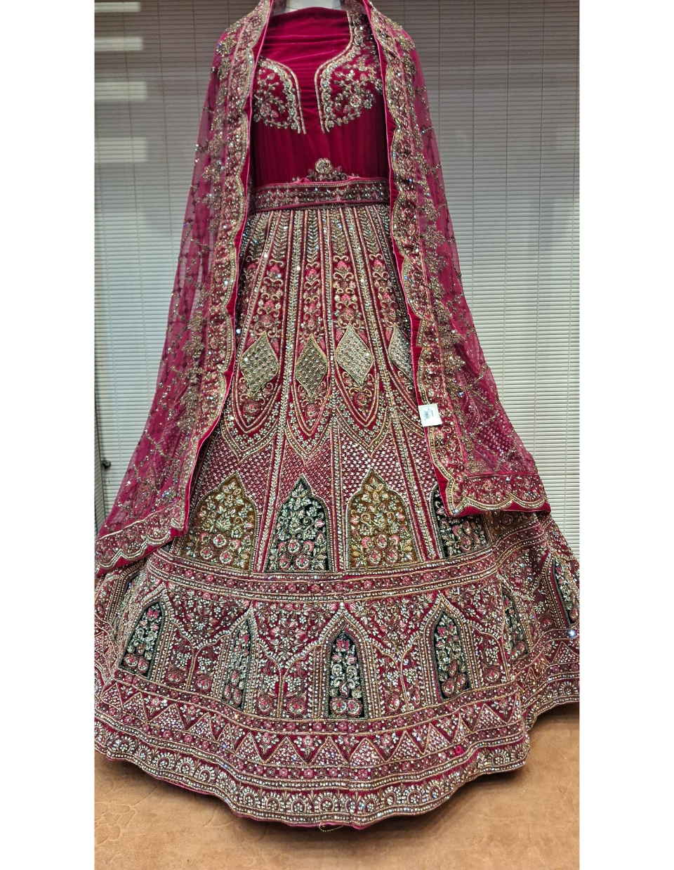 Rani Pink Zardosi and Dabka Embroidered Bridal Lehenga with Velvet Detailing