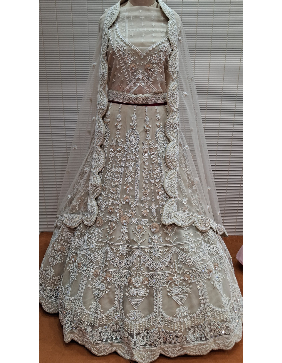 Ivory Net Bridal Lehenga with White Mirror and Thread Embroidery