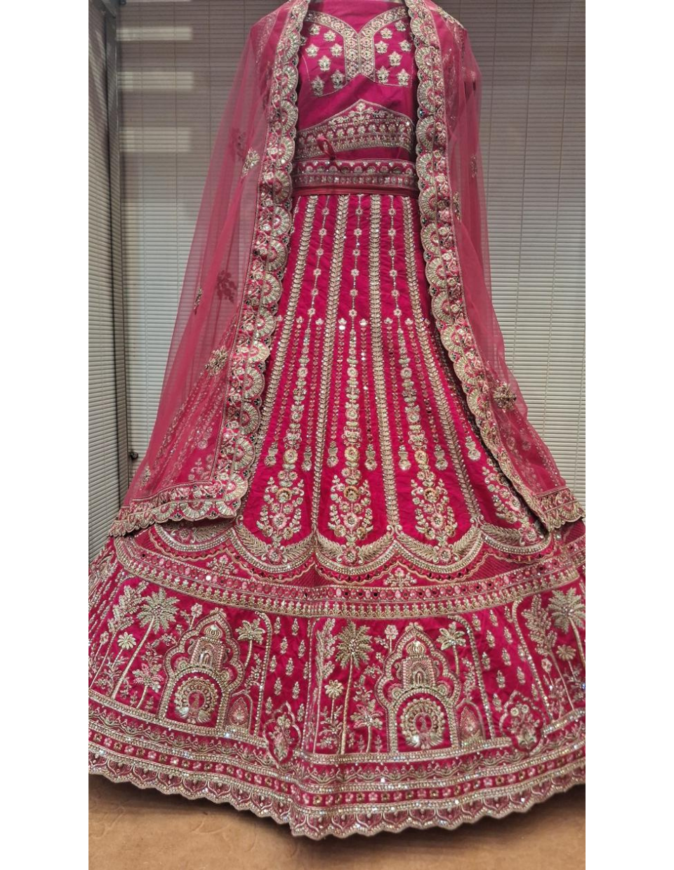Majestic Fuchsia Pink Bridal Lehenga with Intricate Golden Zari Work