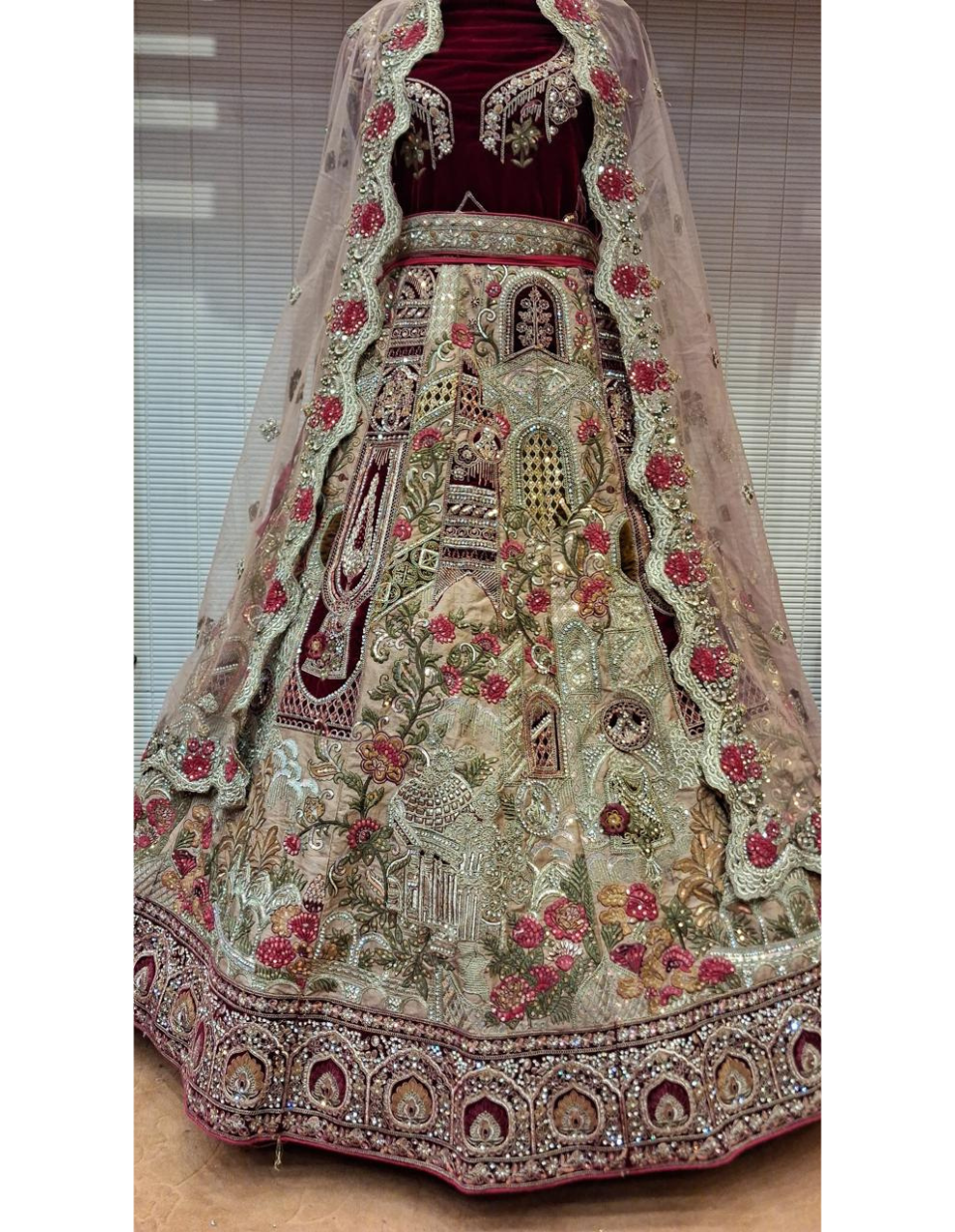 Velvet Maroon and Pastel Bridal Lehenga with Garden Theme Embroidery