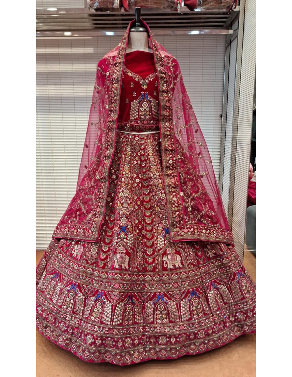 Majestic Rani Pink Velvet Bridal Lehenga with Royal Elephant Embroidery