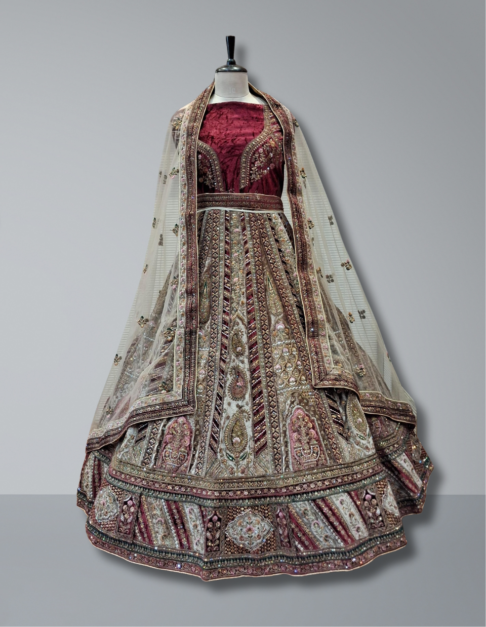 Regal Maroon Bridal Lehenga with Antique Gold and Multicolor Embroidery