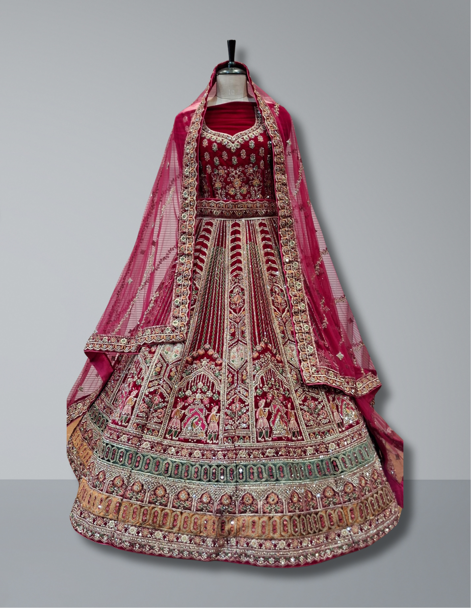 Luxurious Handcrafted Bridal Lehenga in Deep Maroon with Intricate Embroidery