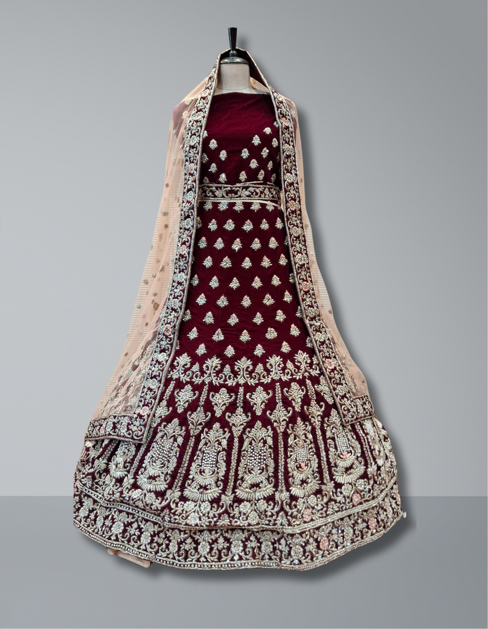 Elegant Maroon Bridal Lehenga with Silver Embroidery and Delicate Net Dupatta