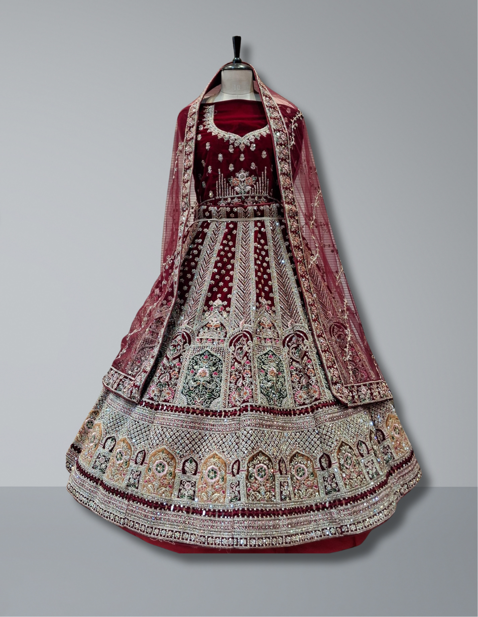 Regal Maroon Bridal Lehenga with Intricate Architectural Motif Embroidery