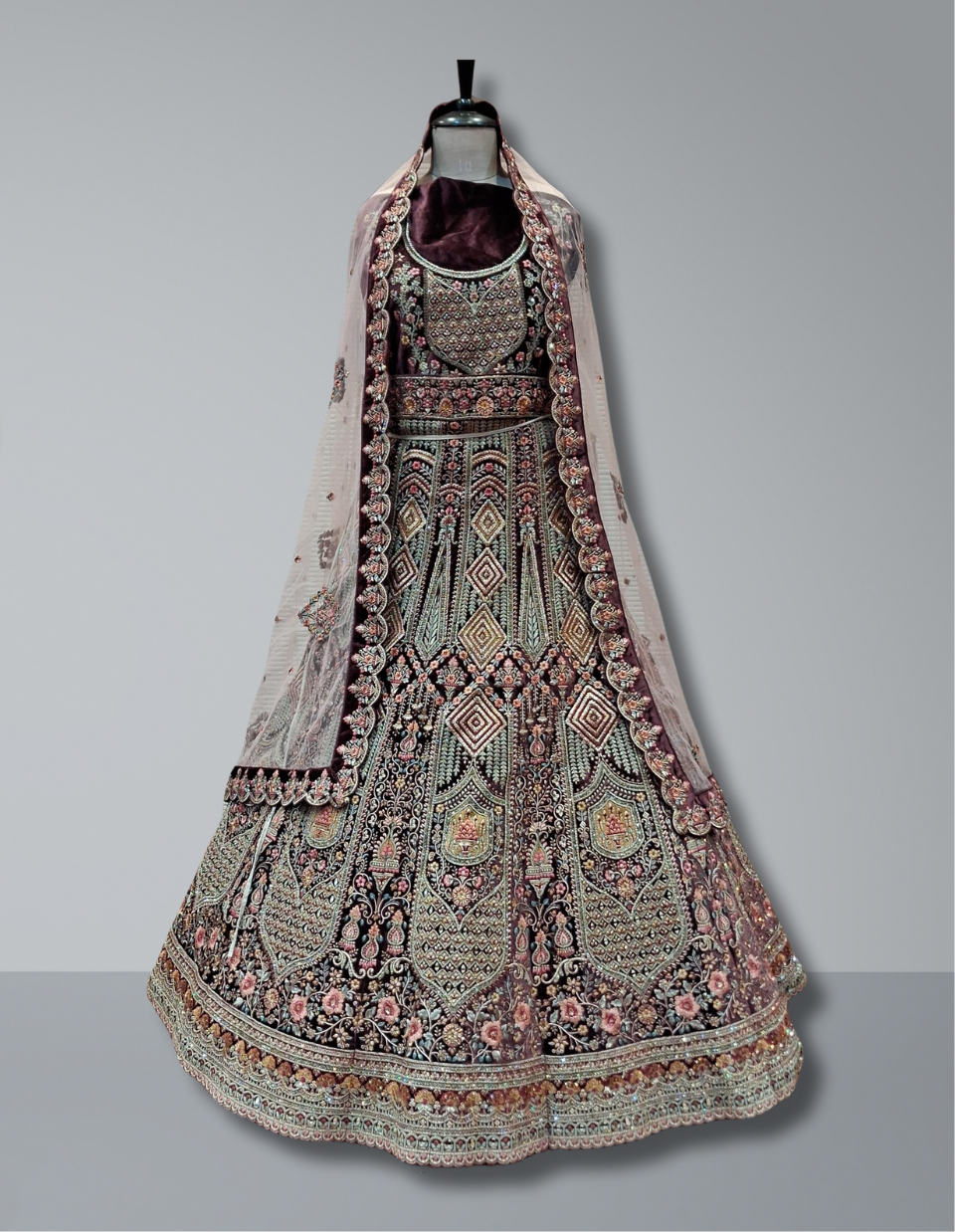 Regal Velvet Bridal Lehenga In Maroon with Geometric and Floral Embroidery