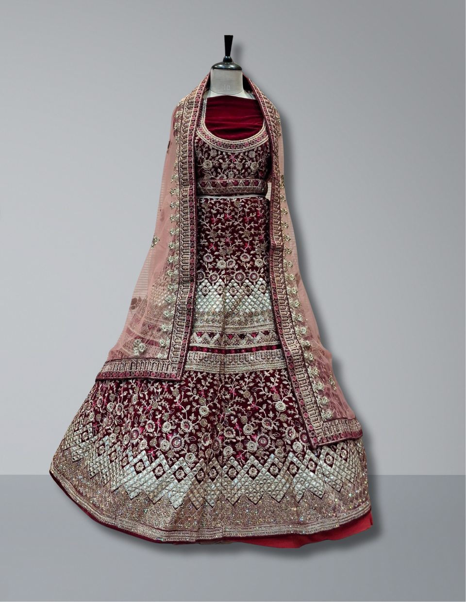 Luxury Maroon Velvet Bridal Lehenga with Rose Gold Embroidery