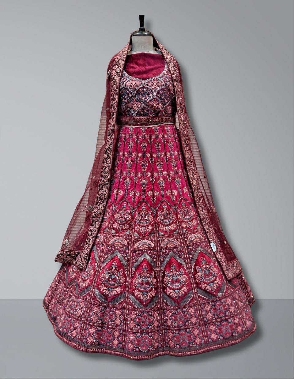Exquisite Magenta Bridal Lehenga with Intricate Embroidery
