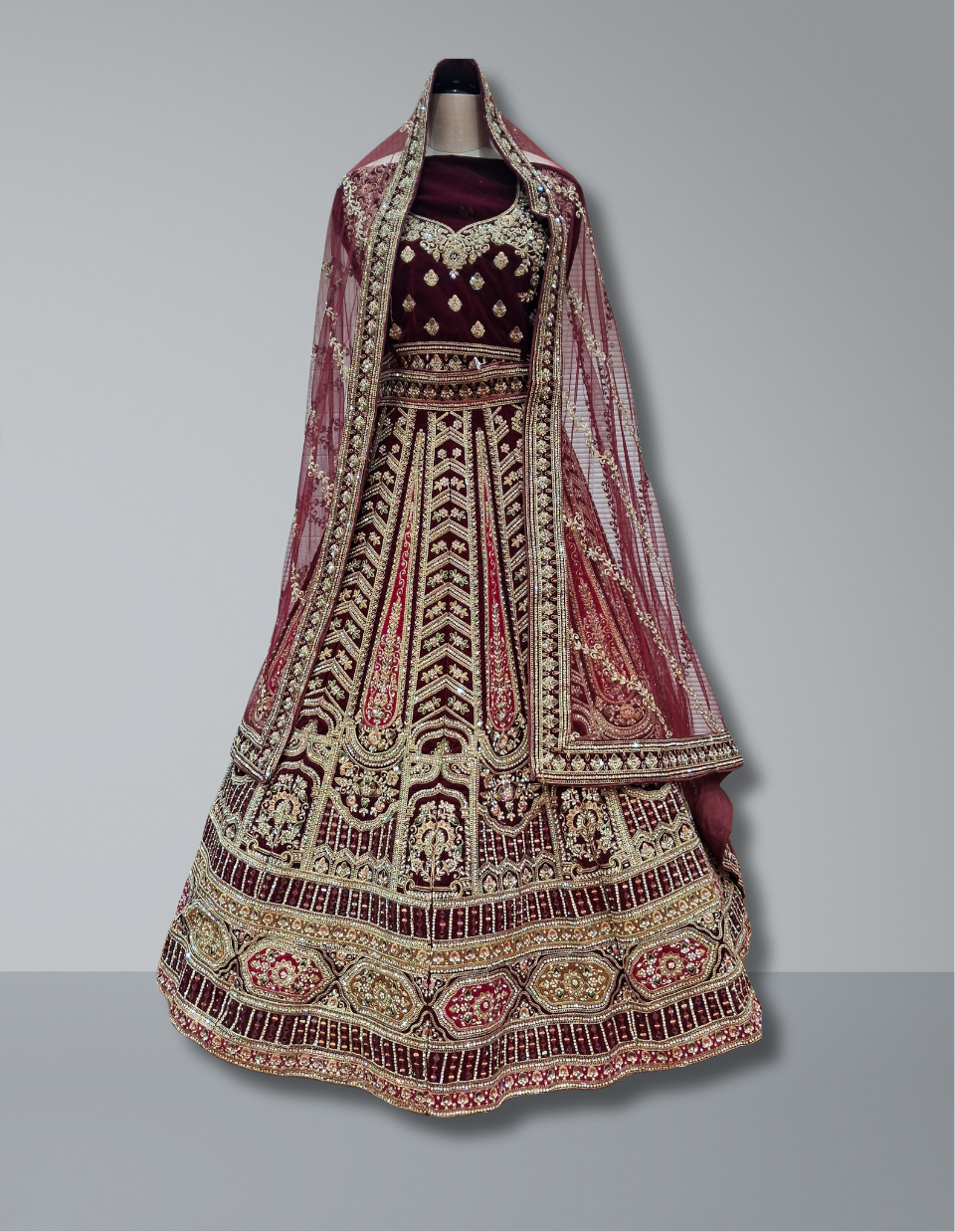 Maroon Velvet Bridal Lehenga with Intricate Embroidery