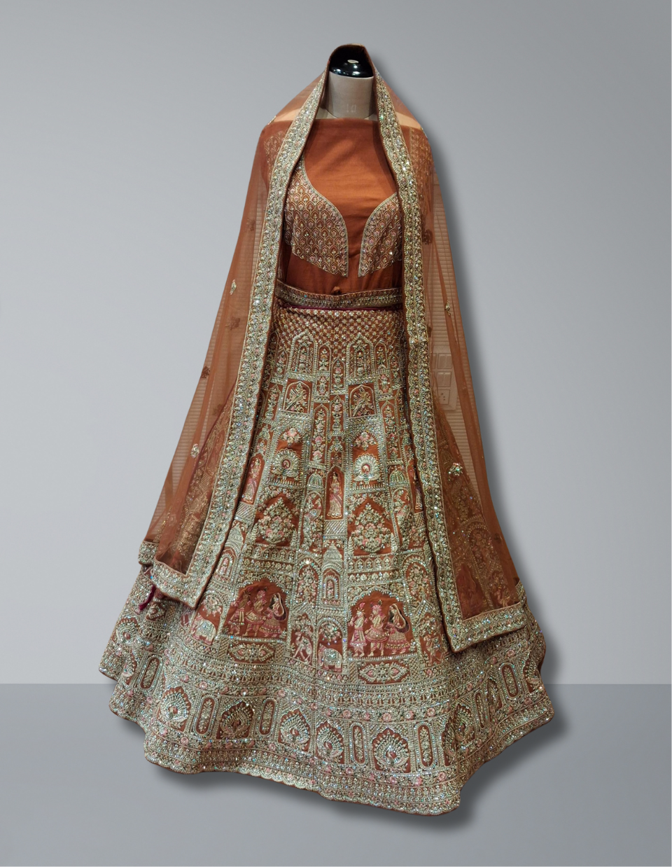 Designer Bridal Lehenga in Orange with Zardozi and Intricate Handcrafted Motifs