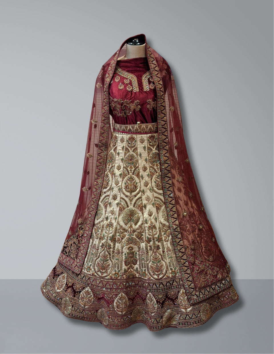 Regal Maroon and Gold Bridal Lehenga with Intricate Embroidery