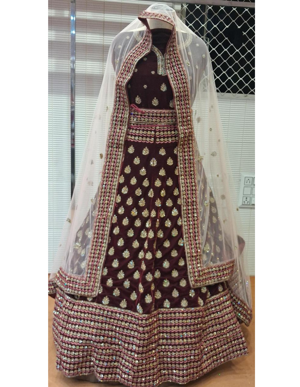 Deep Maroon Velvet Bridal Lehenga with Heavy Gold Embroidery