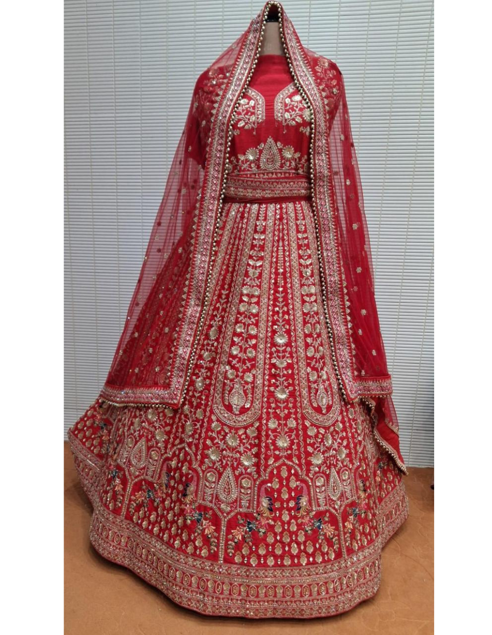 Classic Red Bridal Lehenga with Rich Golden Zari Work