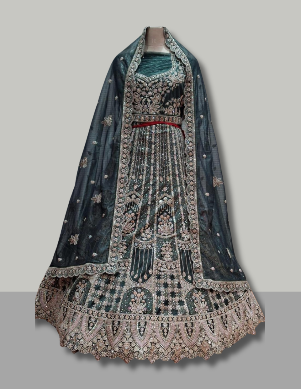 Teal Green Velvet Lehenga with Mirror and Zari Embroidery