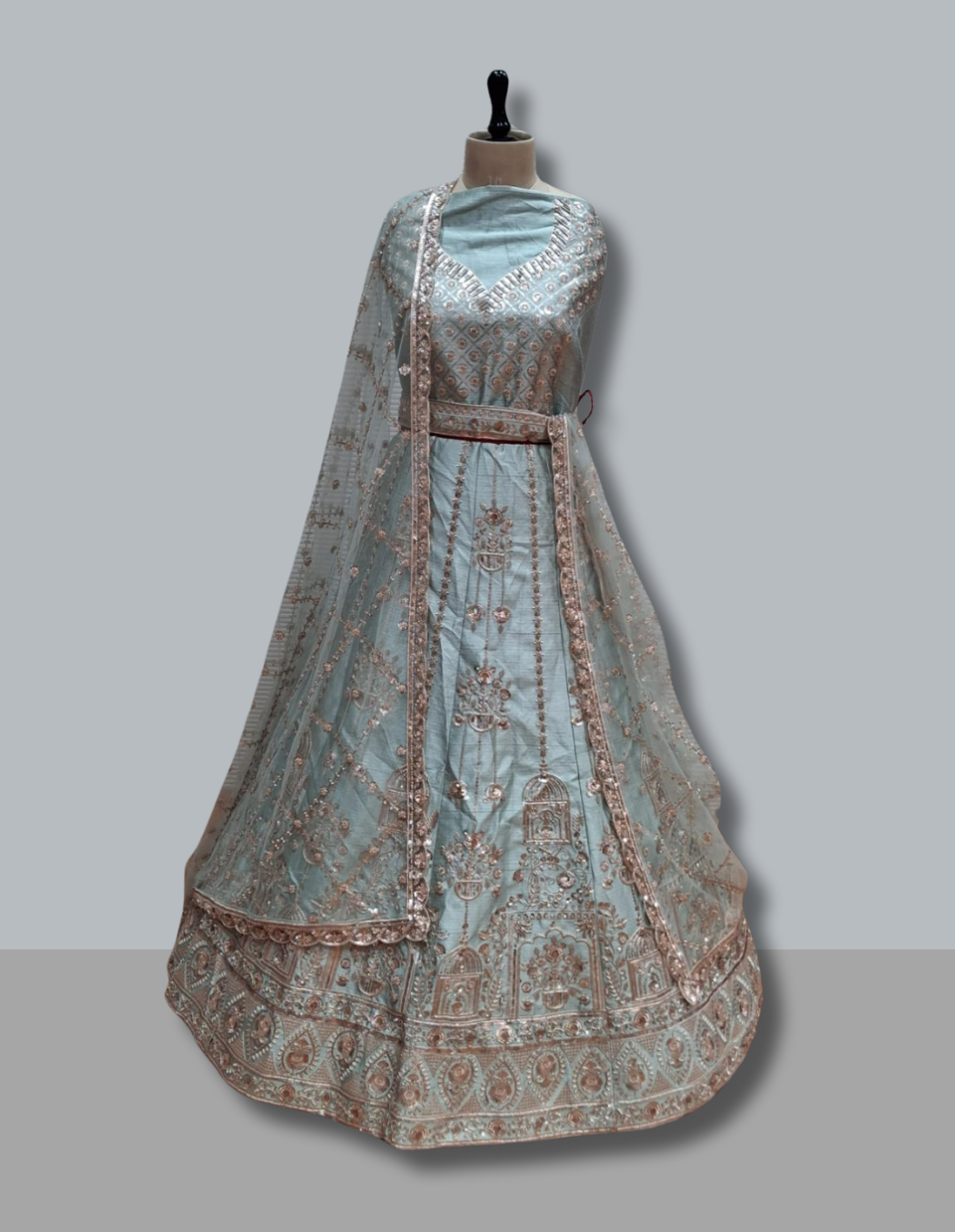 Aqua Blue Wedding Lehenga with Intricate Embroidery and Net Dupatta