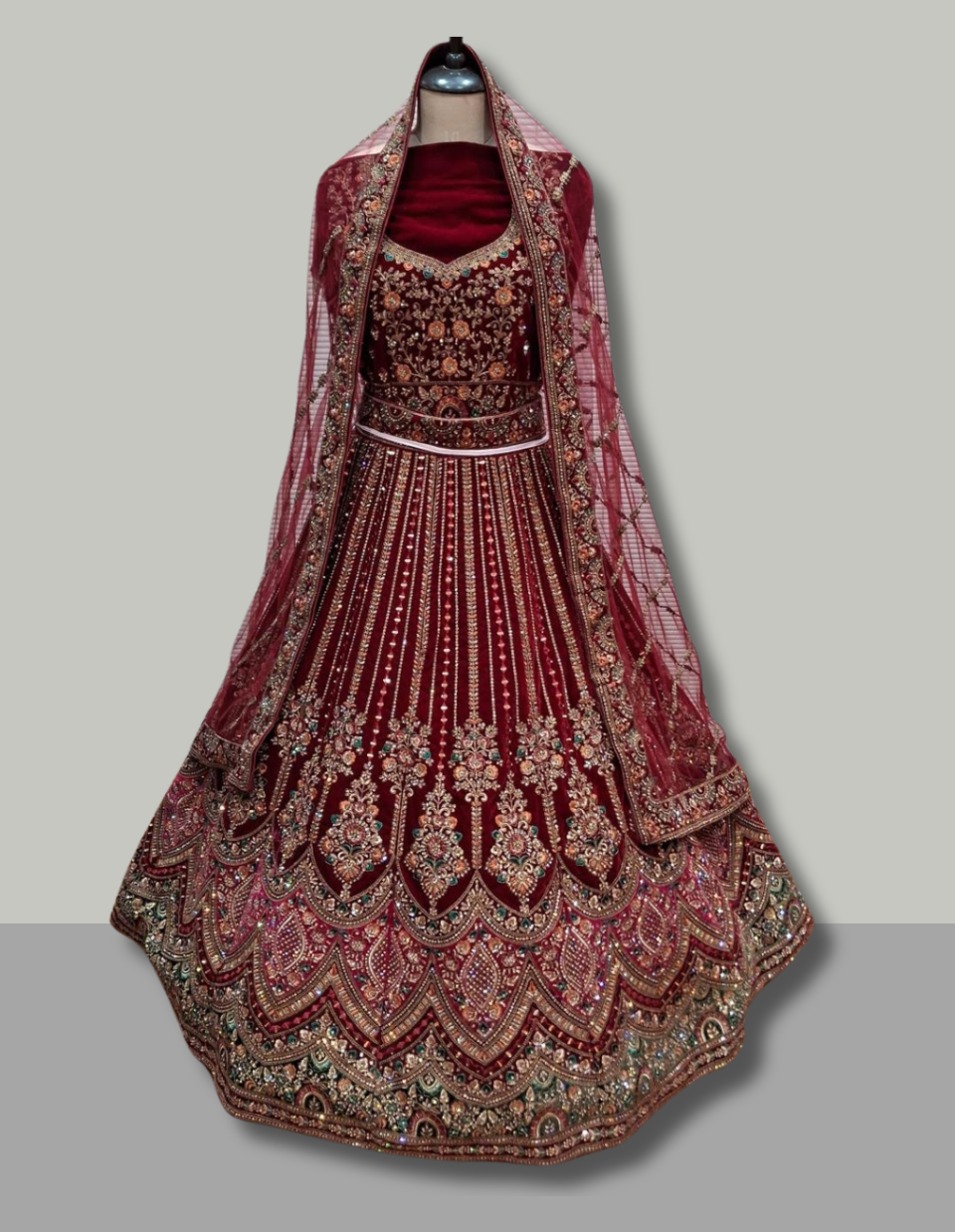 Burgundy Velvet Lehenga with Heavy Dabka Work and Golden Detailing