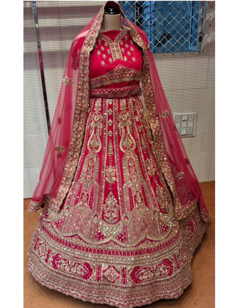Regal Hot Pink Bridal Lehenga with Intricate Gold Zari Work