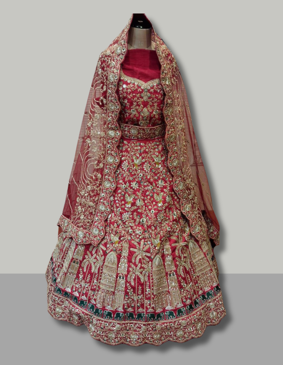 Heritage-Inspired Red Lehenga with Palace and Elephant Motifs