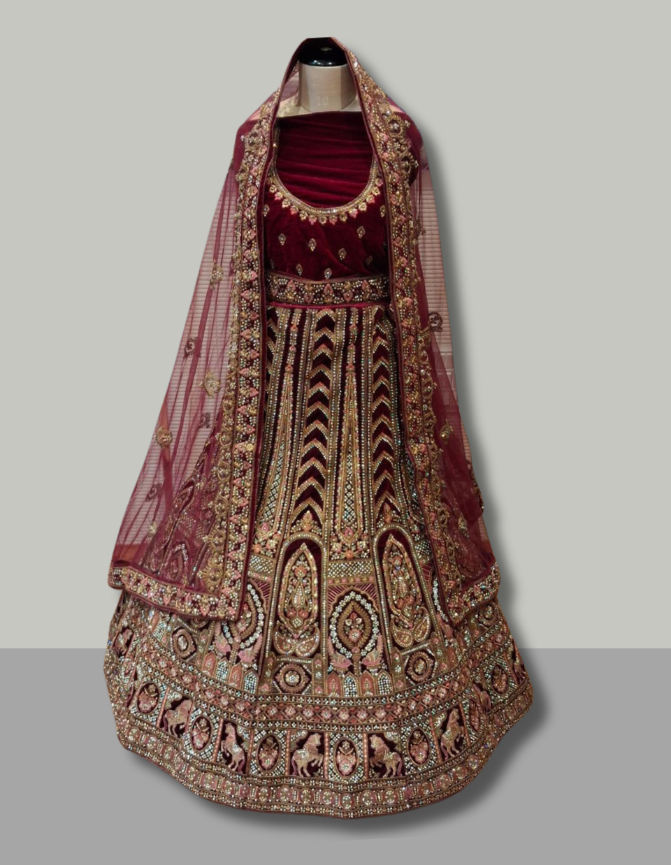 Maroon Velvet Bridal Lehenga with Heavy Zari and Peacock Motif Embroidery