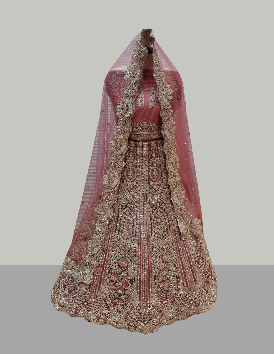 Rose Pink Heavy Bridal Lehenga with Golden Embroidery