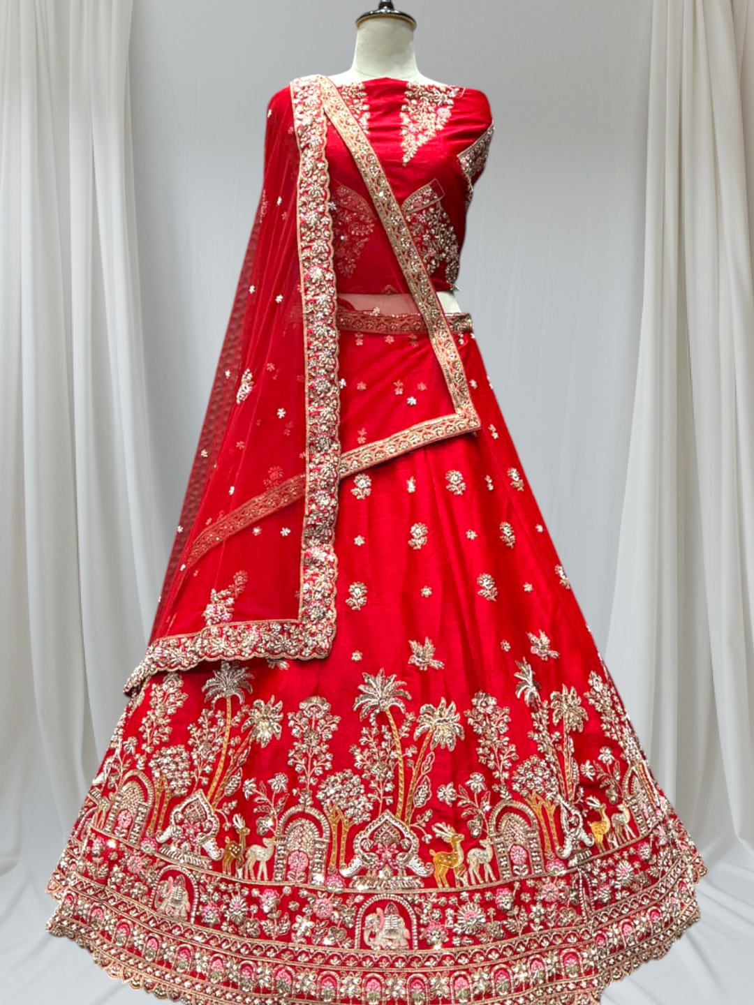 Red embroidered bridal lehenga for brides