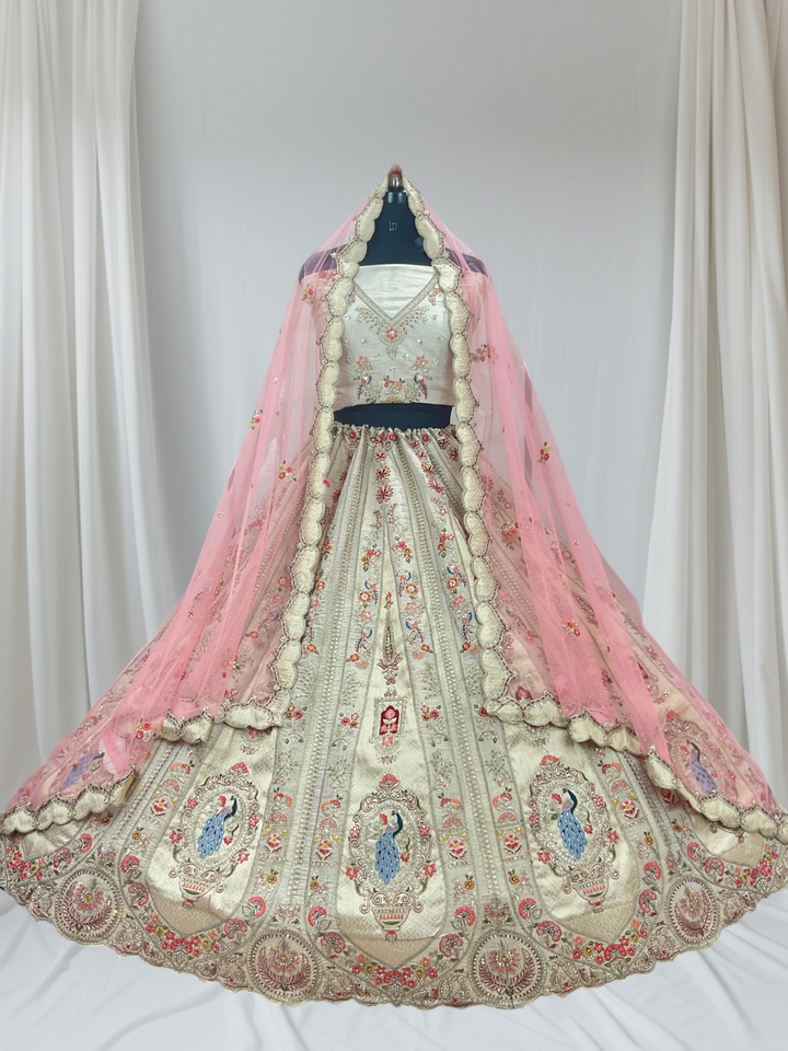 Ivory Colour Embroidered Lehenga with Net Pink Dupatta