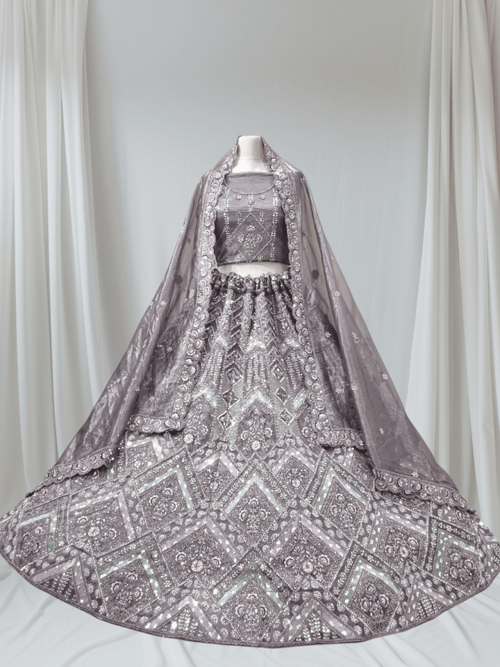 Designer Partywear Lehenga Choli with Heavy Embroidery & Shimmer Dupatta