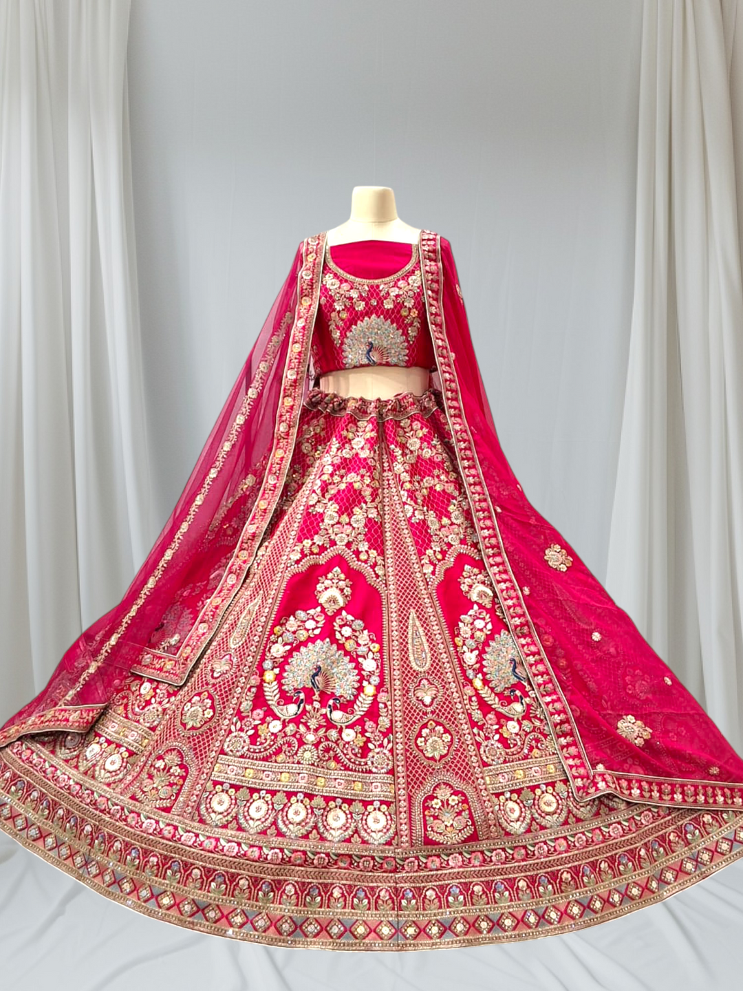 Royal Peacock Bridal Lehenga Available In Red And Rani Colour